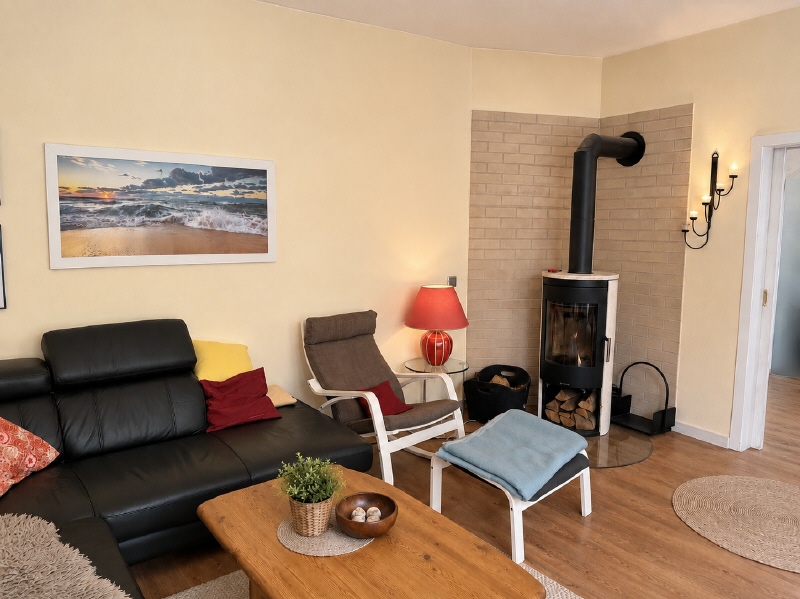 Wohnzimmer mit Kamin Einfamilienhaus B�nde