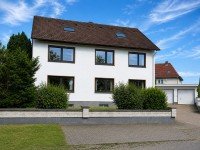 Hauptbild Dreifamilienhaus mit drei vermieteten Wohneinheiten und Doppelgarage in Löhne